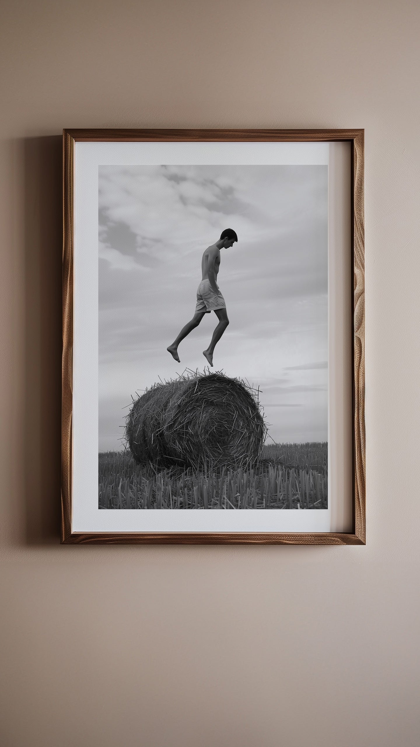 A person leaping above a haystack in 'Haystack Leap'.